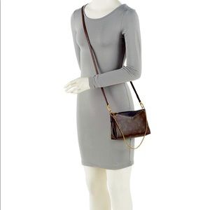 Authentic Louis Vuitton Pallas clutch in monogram and noir leather, flawless